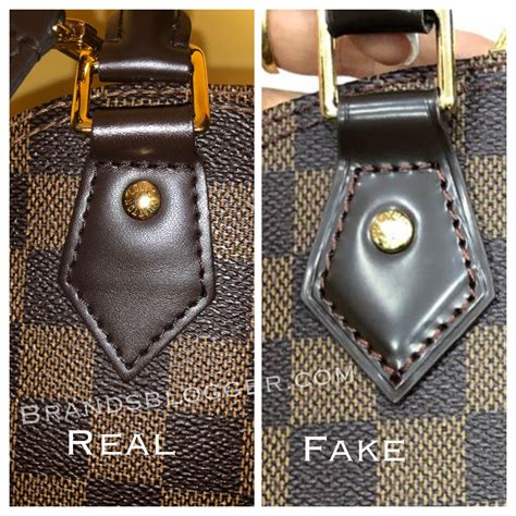 how to spot a fake alma louis vuitton bag|authentic louis vuitton alma handbag.